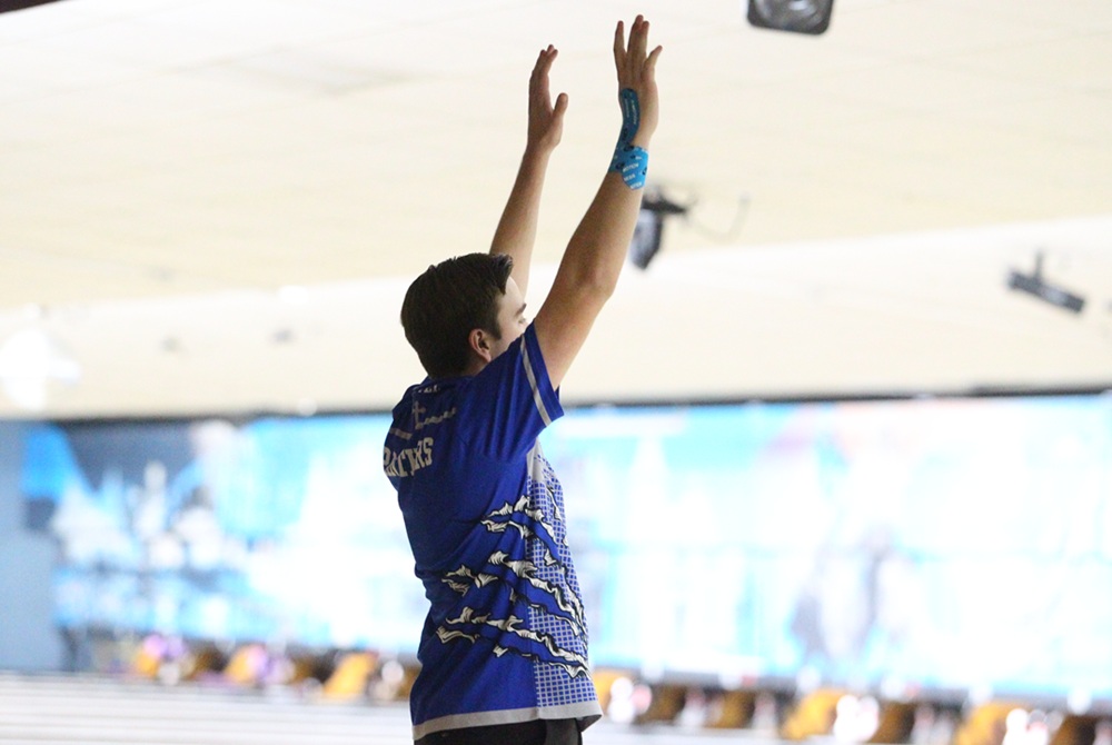 Saginaw Nouvel Catholic Central’s Alex McCarthy celebrates during his run to the Division 4 singles championship last season.