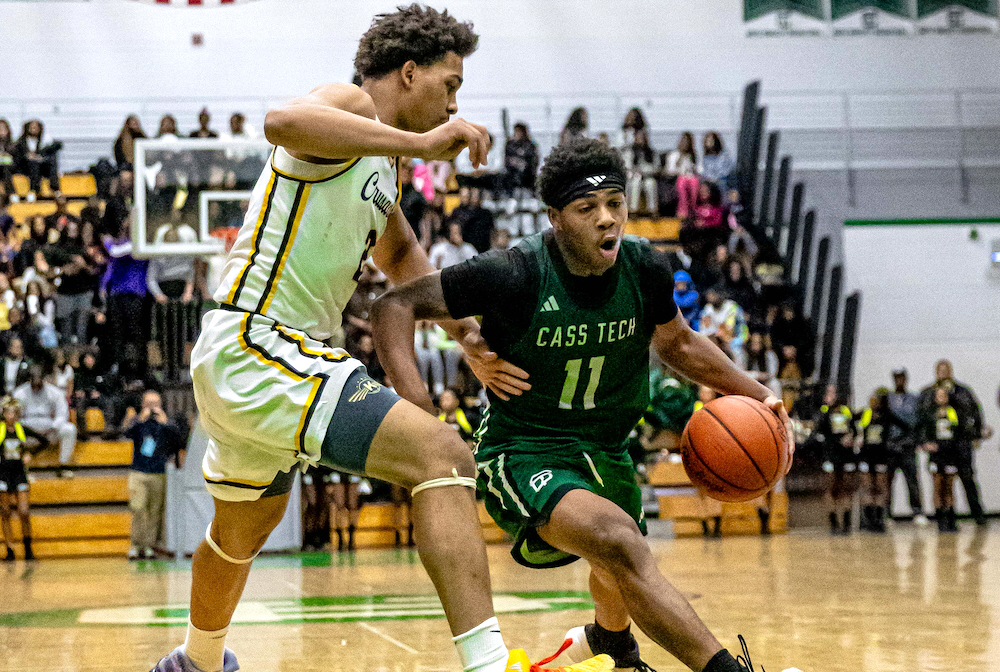 Detroit Cass Tech’s Amari Wash (11) makes a move toward the lane during his team’s Division 1 District Final win over Detroit Martin Luther King on Friday.