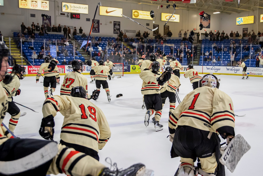 Houghton players celebrate at the end of the Division 3 Final at USA Hockey Arena.
