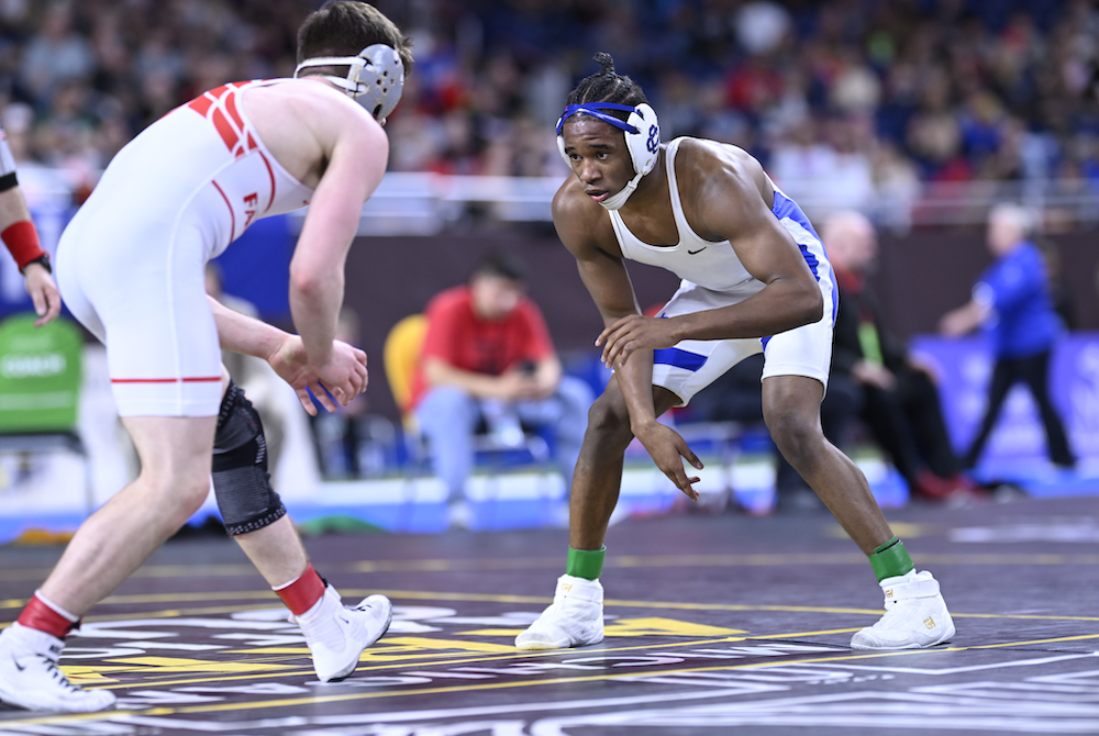 Grand Rapids Catholic Central's Dale Gant, right, prepares for his next move against Constantine's Bear Geibe during their Division 3 championship match Saturday at Ford Field. 