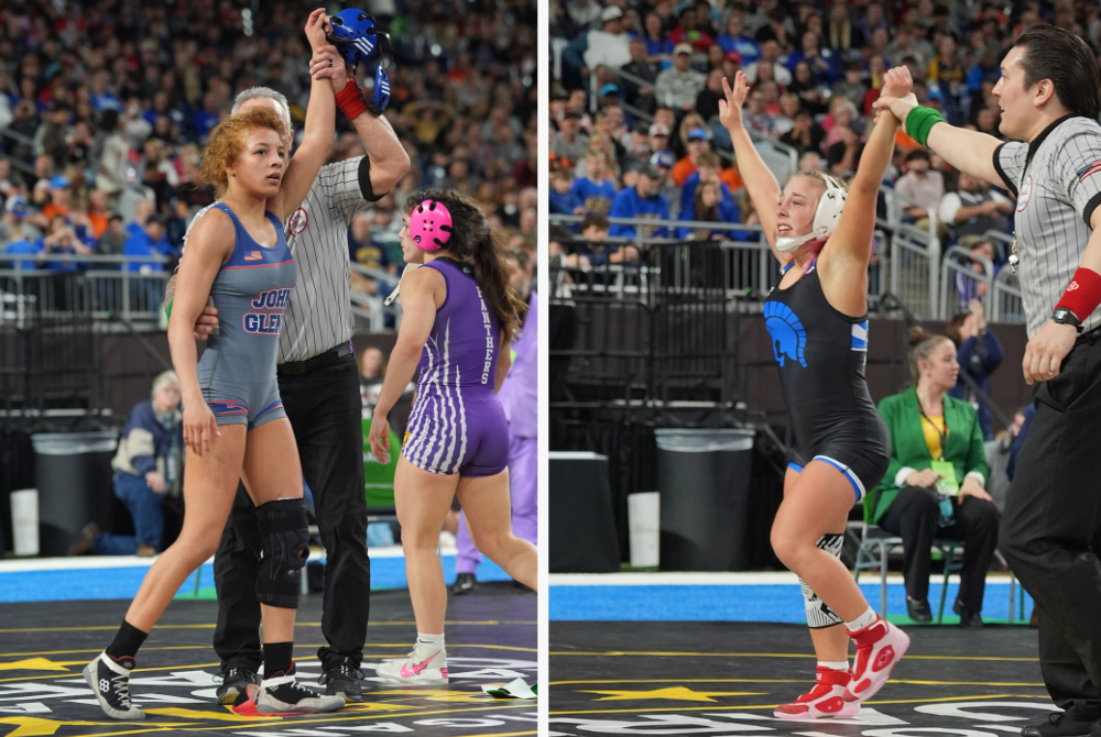 Westland John Glenn's Nakayla Dawson, left, and Plainwell's Madison Nieuwenhuis have their hands raised in victory after earning their fourth MHSAA Finals championships Saturday at Ford Field. 