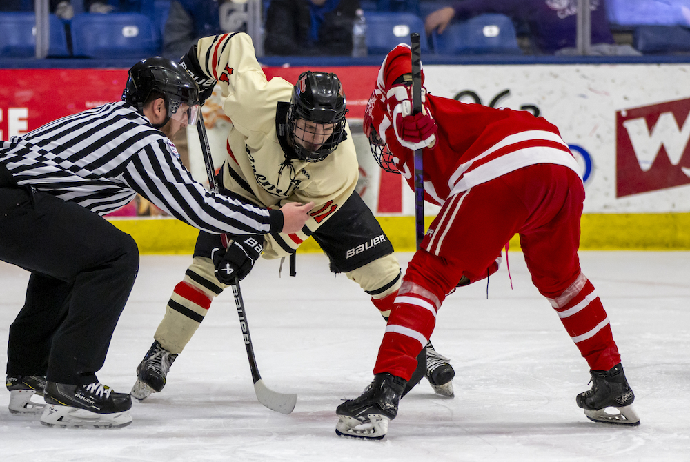 Houghton's Jack Sayen readies for the puck to drop during his team's championship game against Orchard Lake St. Mary's