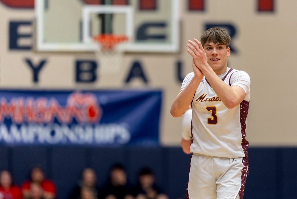 Menominee’s Tanner Theuerkauf (3) claps during his team’s Division 3 Quarterfinal win over Beal City on Tuesday. 
