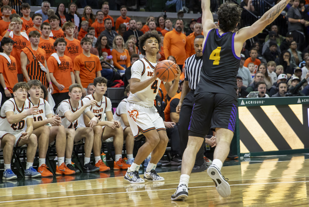 Rockford’s Jace Opoku-Agyeman lines up to take a shot while defended by Avondale’s Maxwell Muhl on Friday.