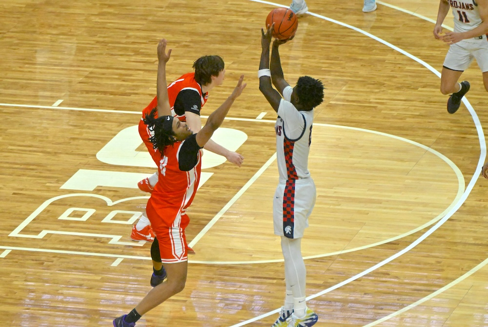East Lansing’s KJ Torbert pulls up for the game-winning shot during the final seconds of his team’s Semifinal victory Friday. (