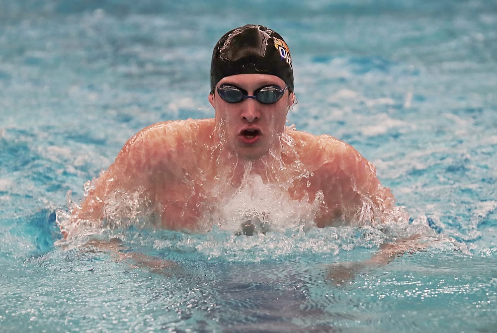 Otsego's Liam Smith swims during a race.