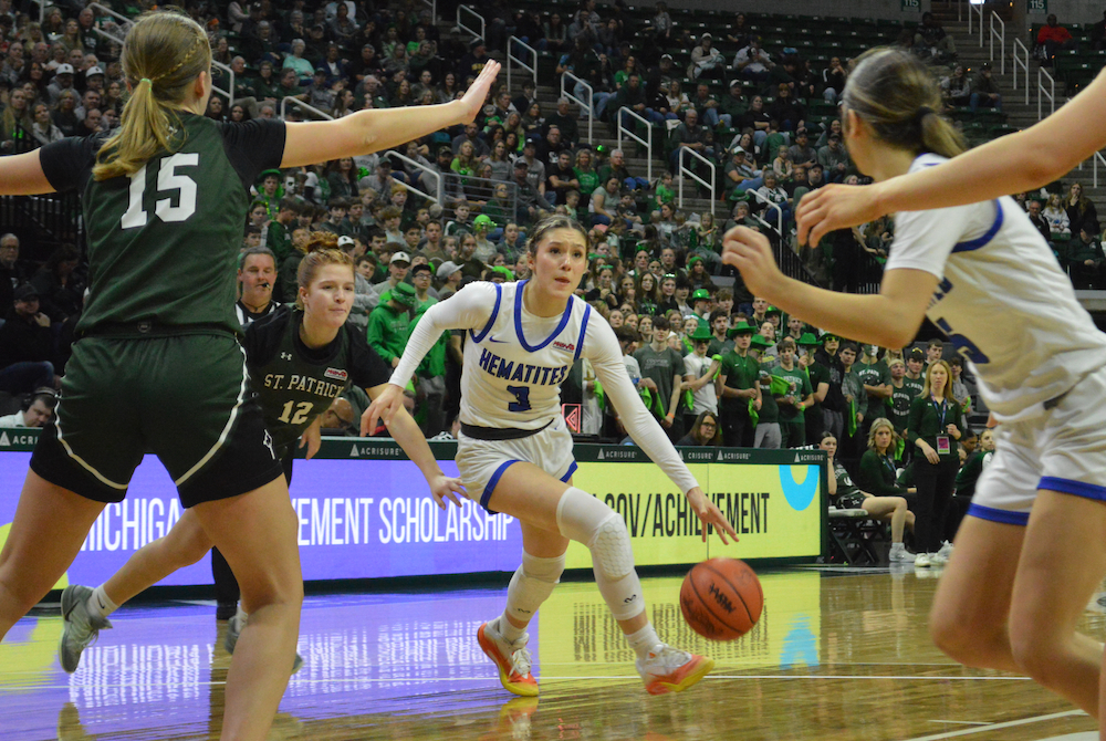 Ishpeming’s Jenessa Eagle (3) drives toward the lane while a teammate cuts to the basket during their Division 4 Final win over Portland St. Patrick at Breslin Center. 