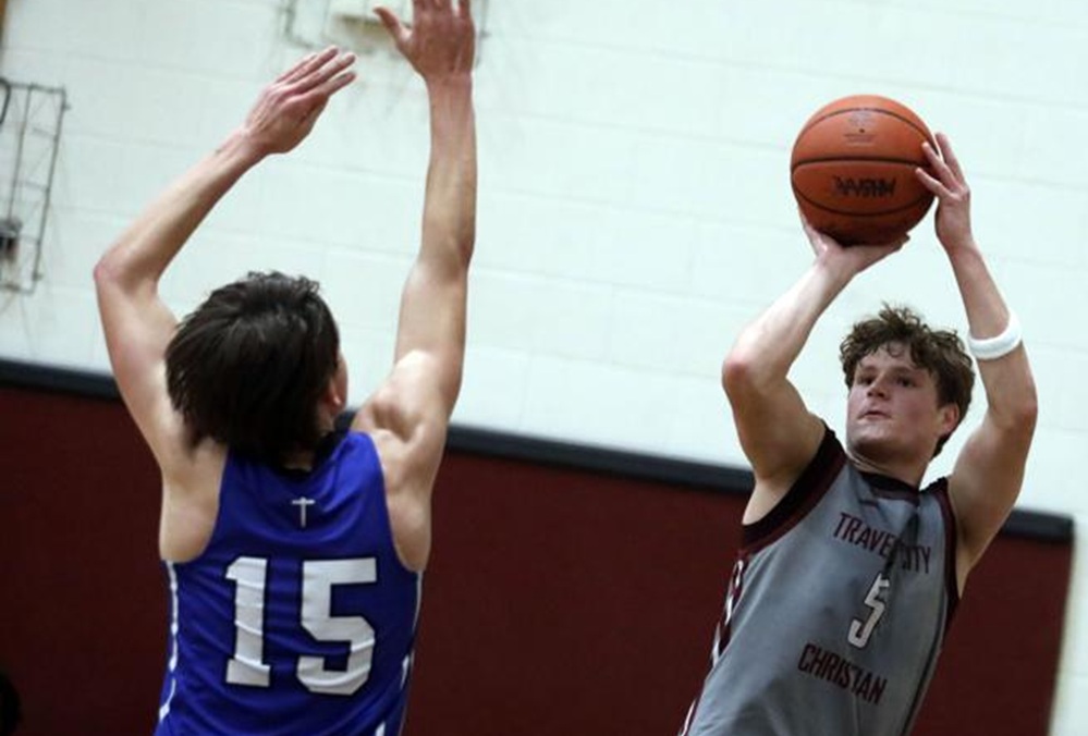 Traverse City Christian’s Reece Broderick shoots a 3-pointer against Gaylord St. Mary during his senior season.