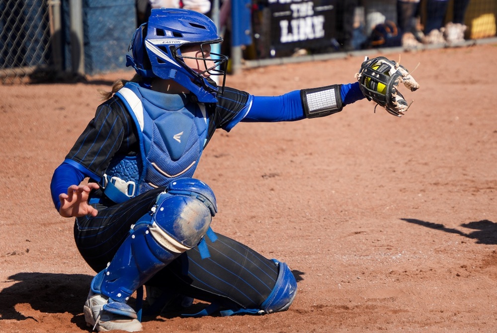 Ravenna catcher Emily Postema receives a pitch. 