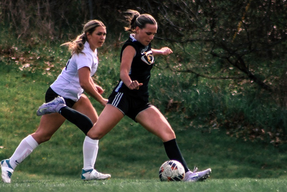 Tri County's Savanah Thompson winds up for a kick during a soccer game. 