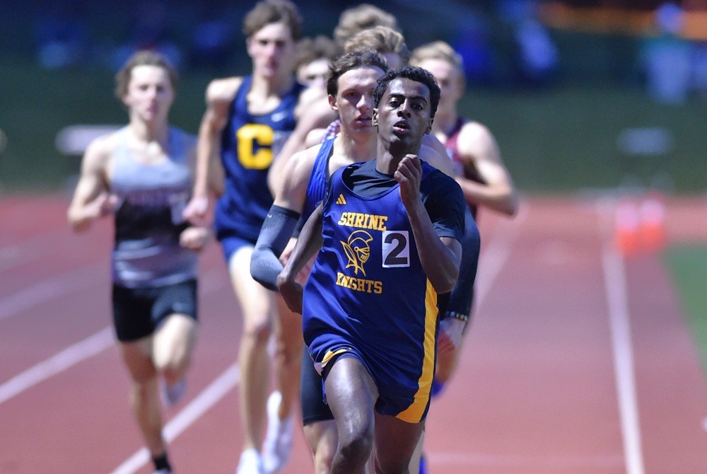 Royal Oak Shrine’s Abenezer Cerone leads during the 800 meters at Friday’s Oakland County Championships. 