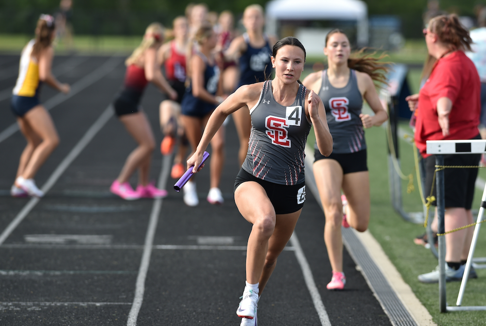 Spring Lake's Megan Guczwa sprints the final leg of the 1,600 relay Saturday at Hamilton. 