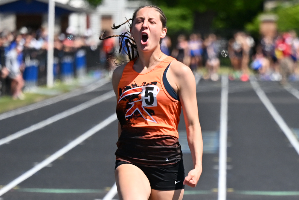 Rudyard's Amelia Fountain celebrates taking first place in the 100 dash Saturday. 