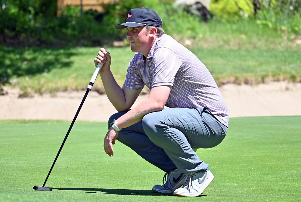  Charlevoix’s Bryce Boss eyes a putt during last week’s Regional at Birchwood in Harbor Springs. 