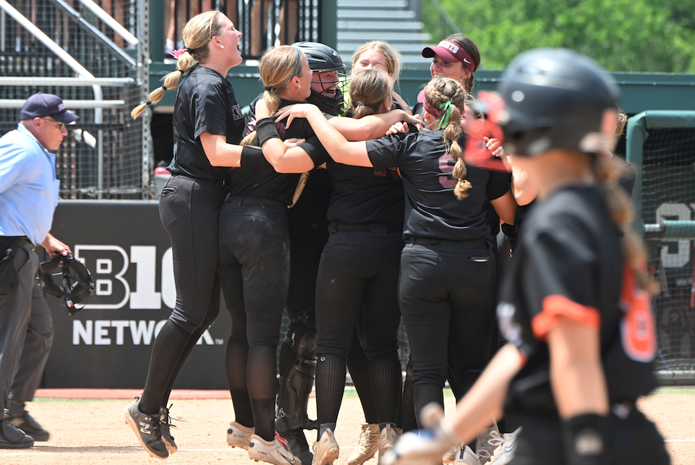 Walled Lake Northern players celebrate after their Semifinal win over Northville on Thursday at Secchia Stadium. 