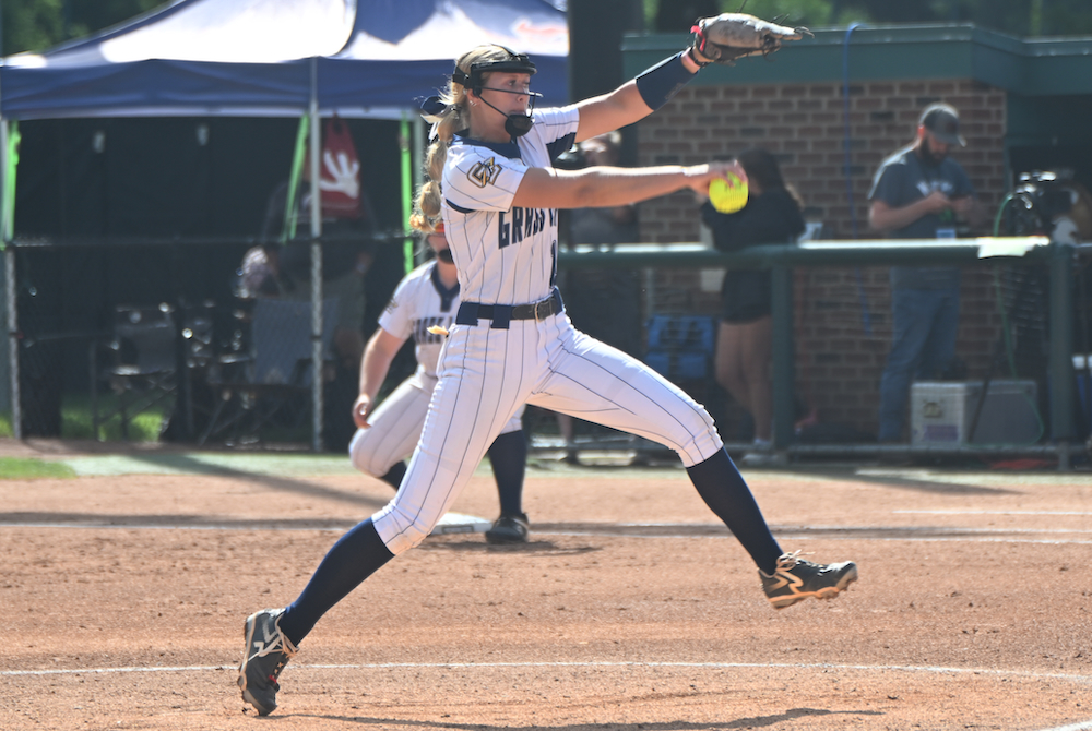 Grass Lake pitcher Morgan Conrad makes her move toward the plate during Friday’s Semifinal win over Evart.