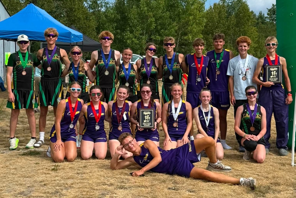 Rapid River and Engadine medal winners stand for a photo together after the Engadine Rock & Roll Relays. (Photo courtesy of the Rapid River cross country program