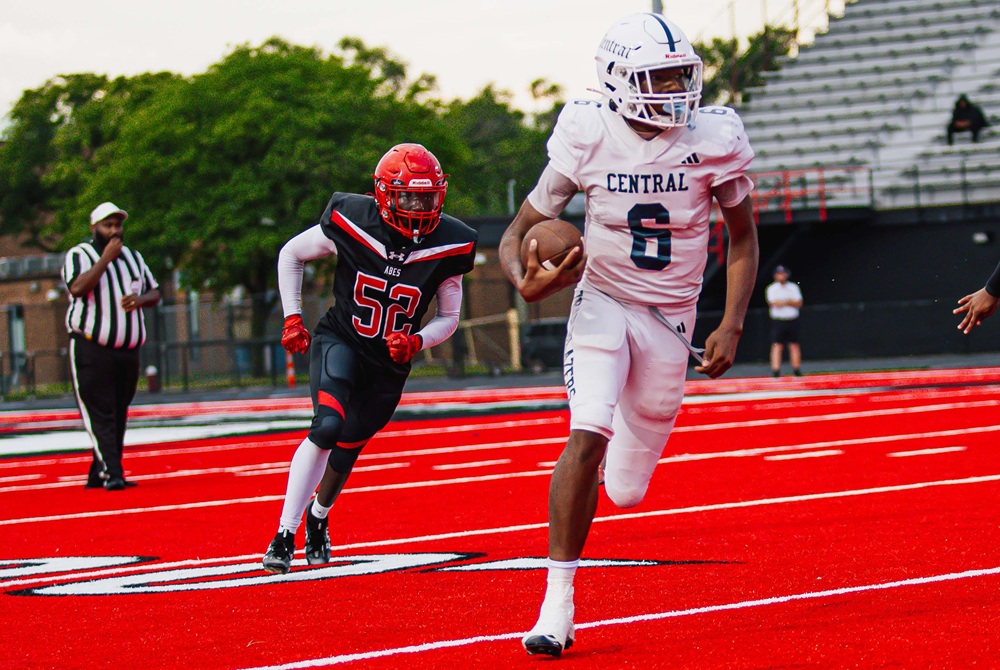 A Detroit Central receiver breaks toward the end zone during the team's 38-0 Week 2 win over Warren Lincoln.