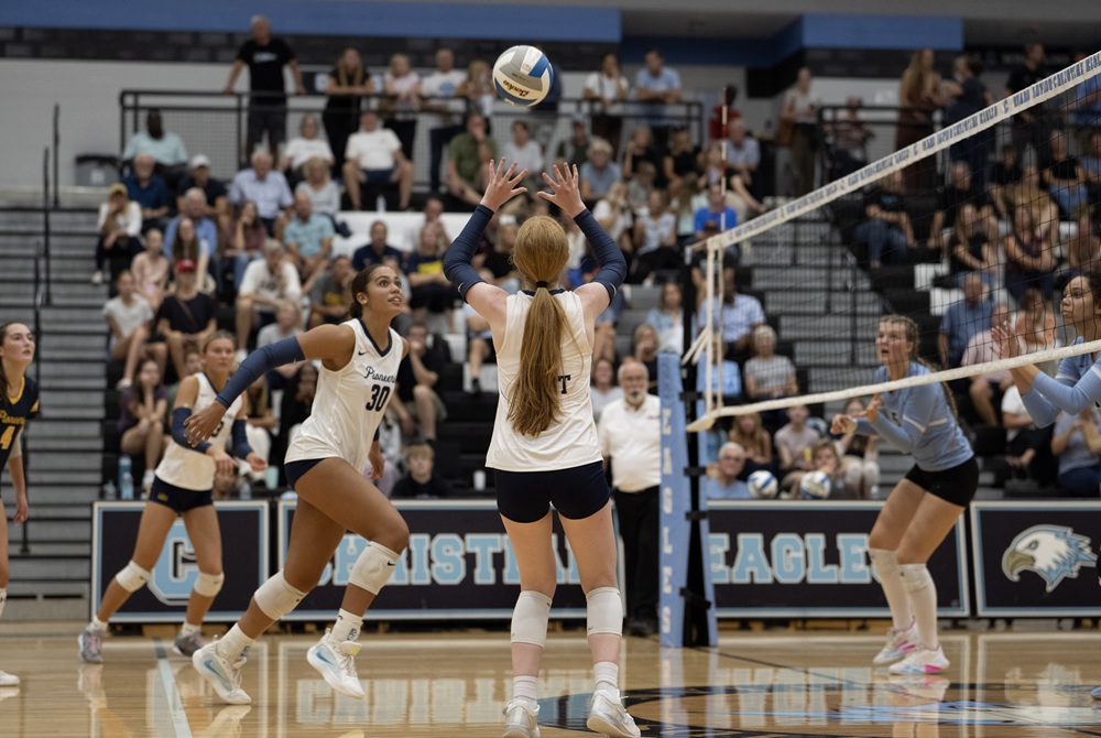 East Grand Rapids lines up for a kill attempt during a match this season against Grand Rapids Forest Hills Northern.