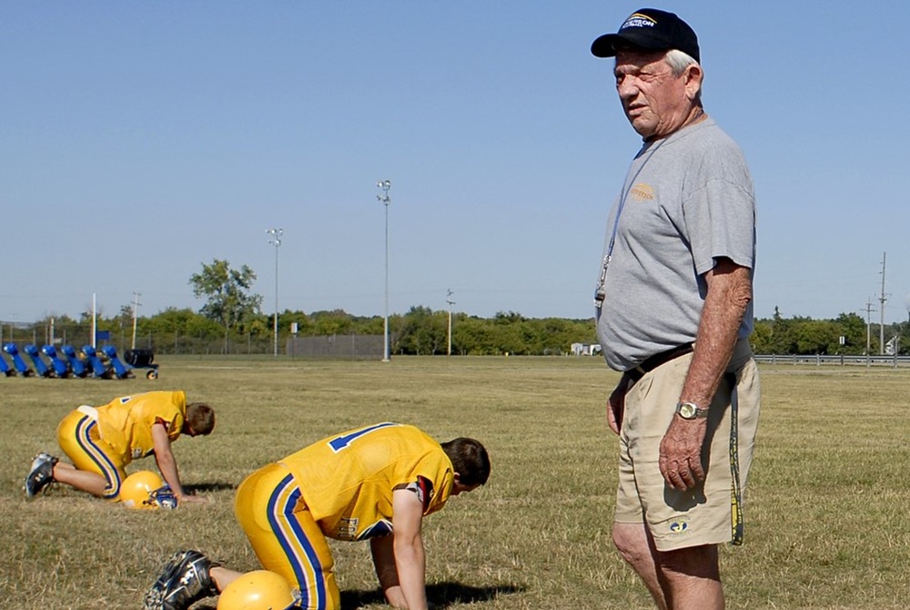Marc Cisco coaches his Monroe Jefferson football team. 