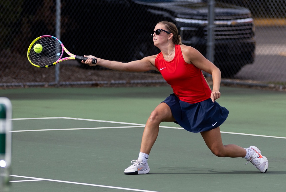 Ishpeming Westwood’s Eliisa Doney sends a forehand during a match Wednesday at No. 2 singles. 