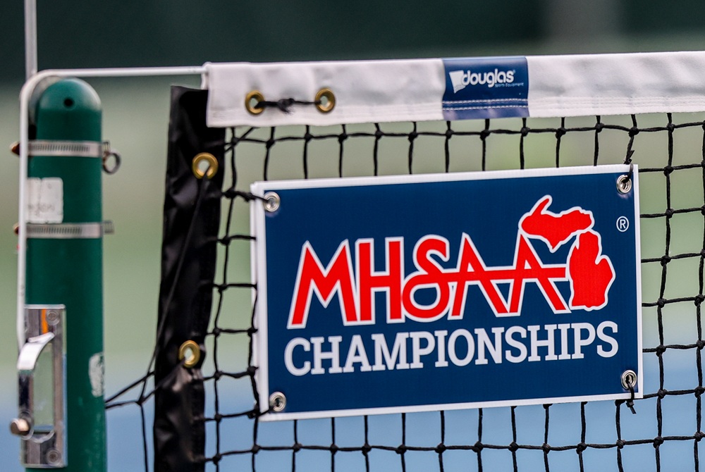 This shows an MHSAA banner connected to a tennis net. 