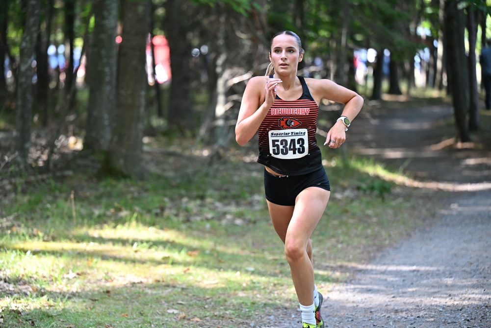 Newberry's Abby Taylor runs to a first-place finish Aug. 28 at the Dale Phillips Invitational held at Presque Isle in Marquette. 