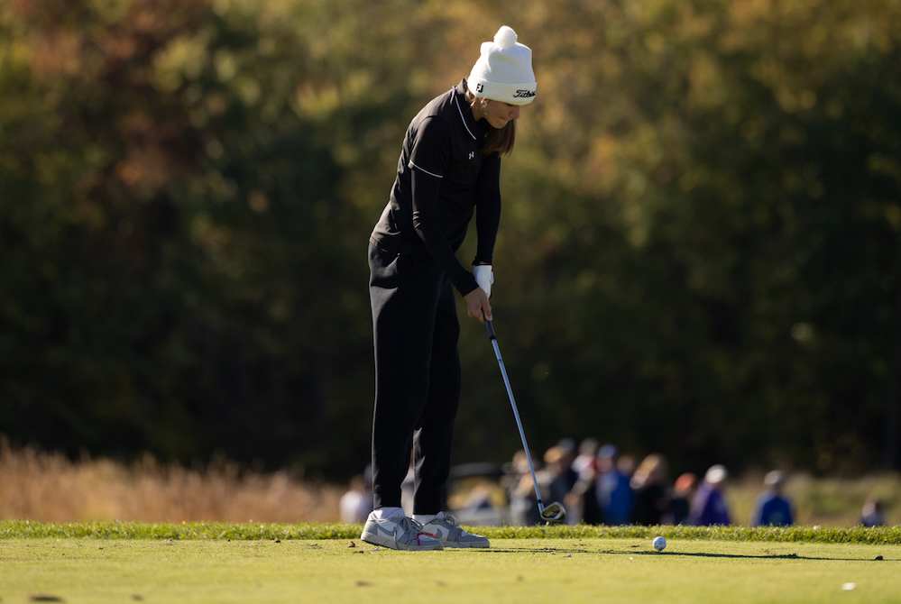 A Bath golfer tees off during the MHSAA Finals.
