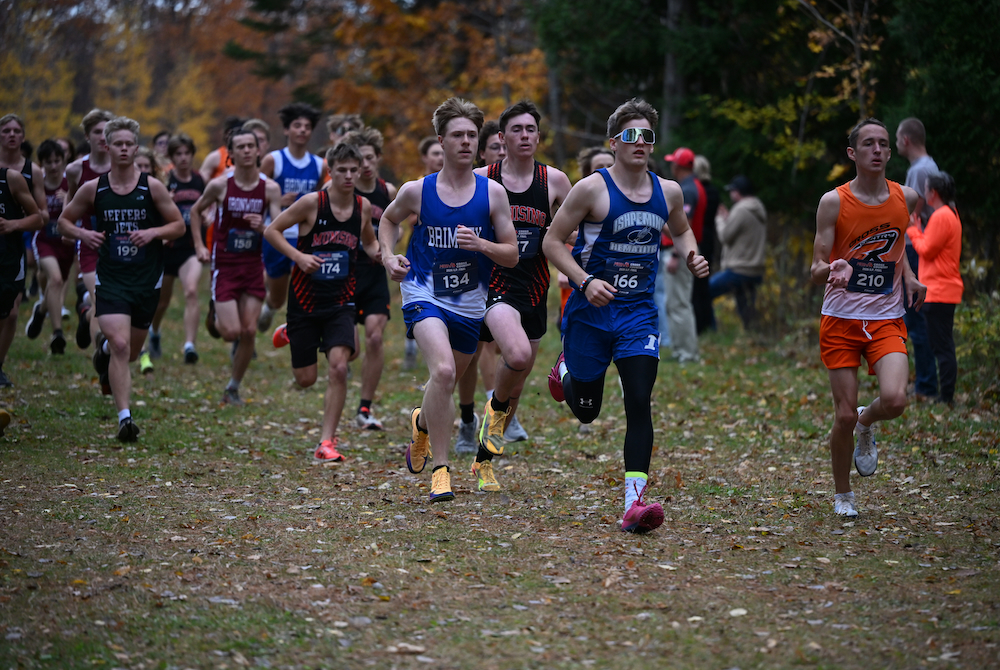 Brimley's Darren Johnson (134), Munising's Blake Lakosky (177), Ishpeming's Kemper Gearhart (166), and Rudyard's Eli Folkersma (210) lead the start of the Upper Peninsula Division 2 Final held on the campus of Michigan Tech in Houghton. 