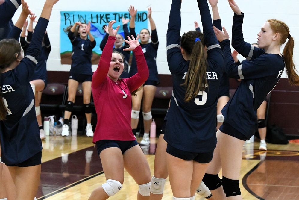 Fowler players celebrate Saturday during a league tournament match against Pewamo-Westphalia.
