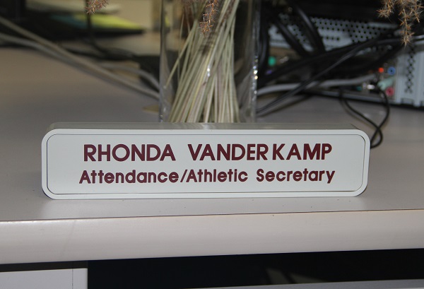 Rhonda VanderKamp has welcomed thousands of students during her time as athletic and attendance secretary. 