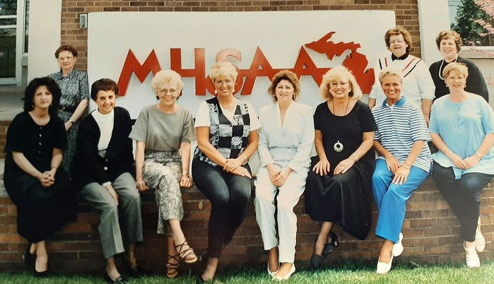 Jackson, sitting fourth from left, was the “baby” of the MHSAA staff after joining when she was 18. 