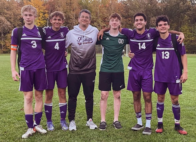 The Calvary Baptist seniors (and coach), from left: John Adams, Isaac Wallace, coach James Day, Lucian Snyder, Charley Tomko and Dyllon Ouderkirk. 