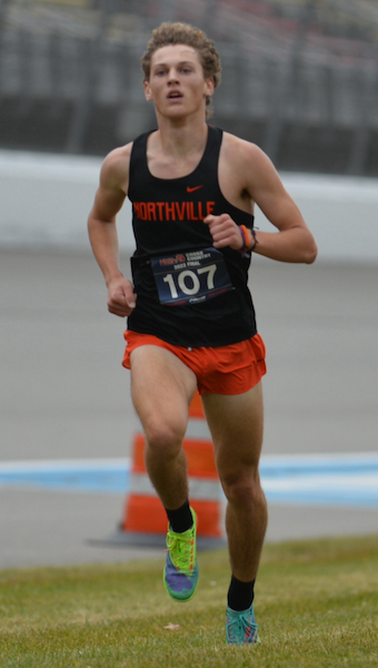 Northville’s Brendan Herger pushes toward the finish in placing third for the team champion.
