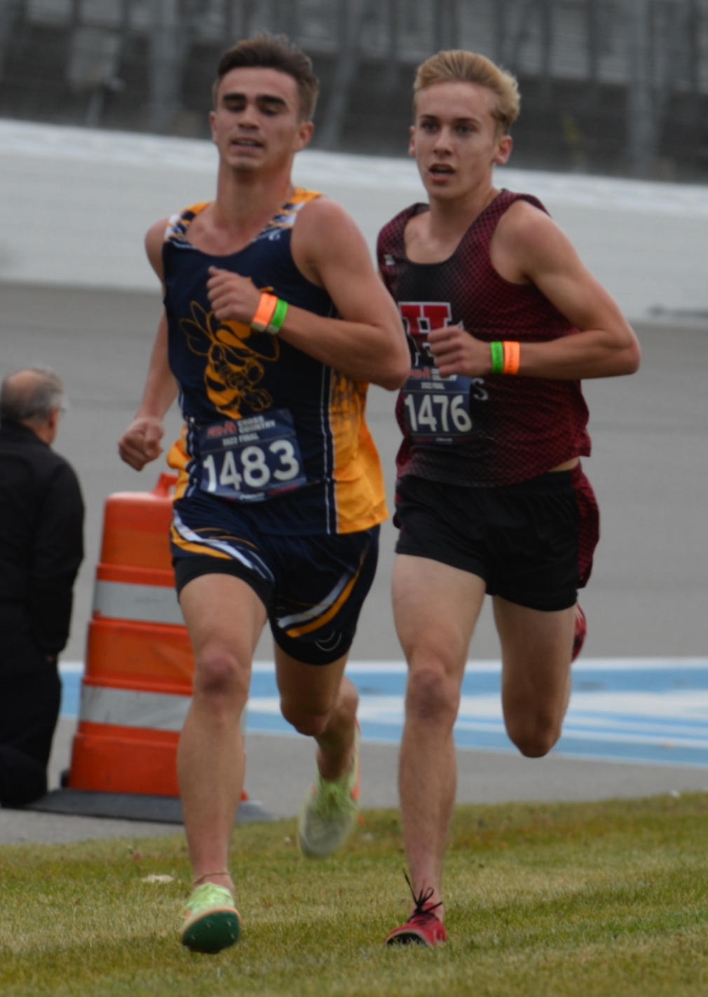 Hart’s Clayton Ackley, right, and Ithaca’s Parks Allen run stride for stride together toward the finish.