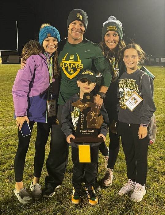 Flat Rock coach Buck Reaume and his family celebrate the District title win. 