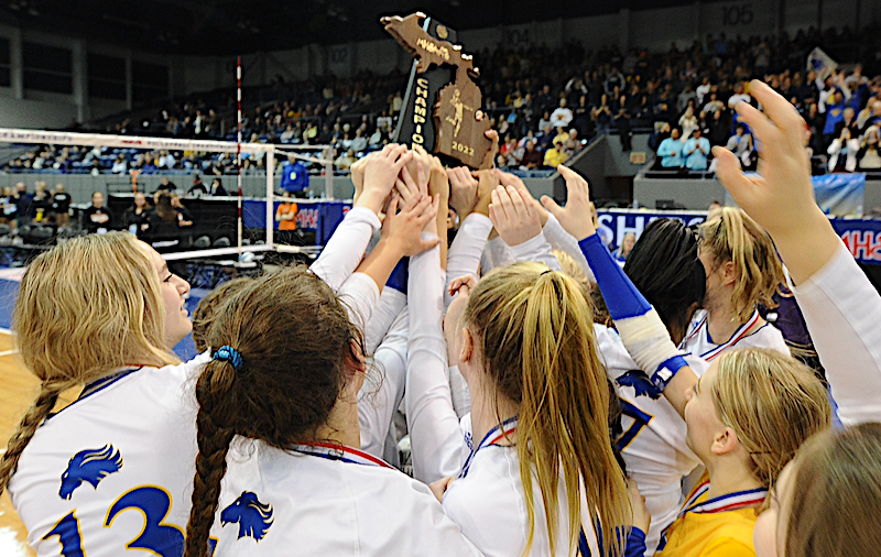 Marian celebrates its third-straight Finals victory. 