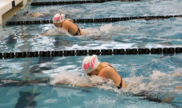 Swimmers approach the wall during the 100 breaststroke final.