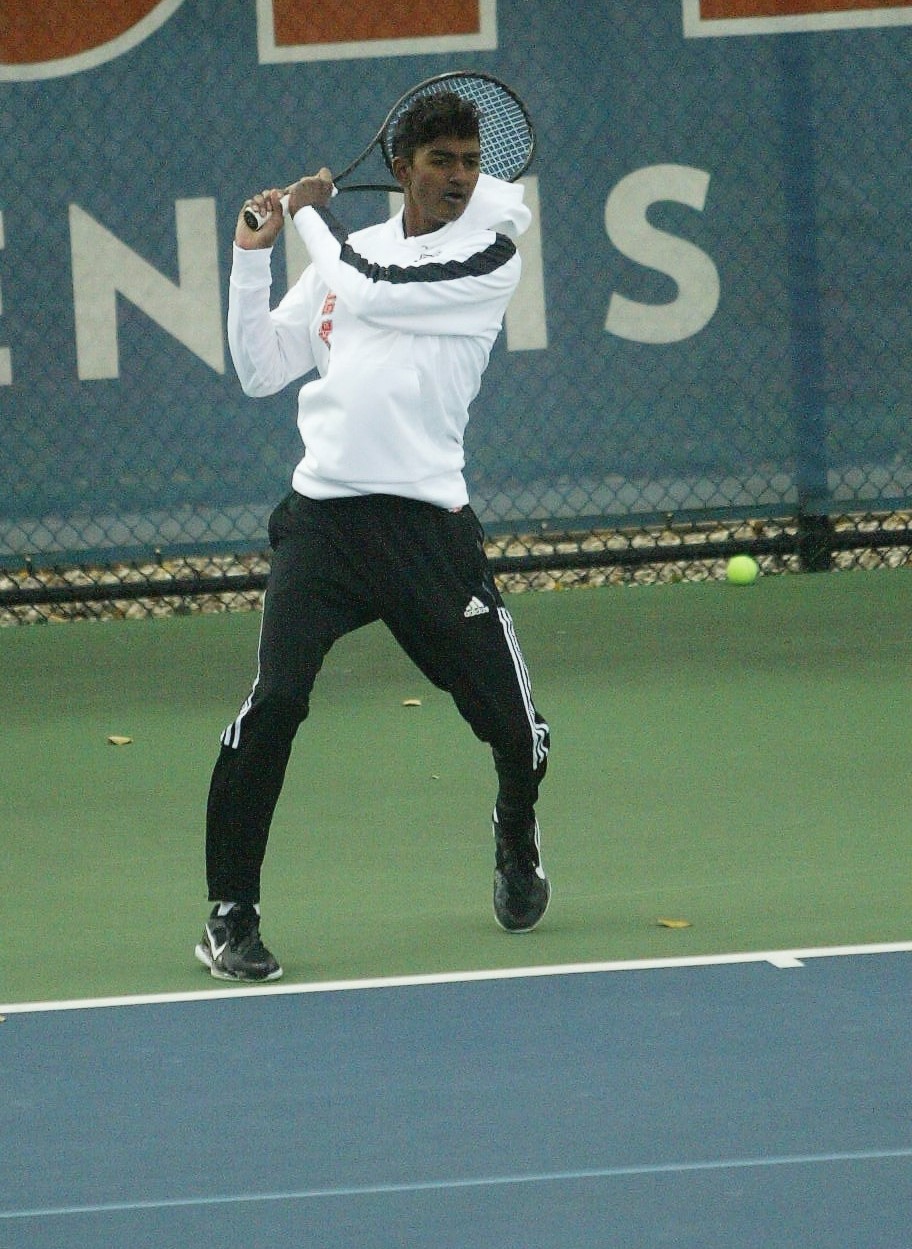 Northville junior Sachiv Kumar fires a backhand during his No. 1 singles final. 