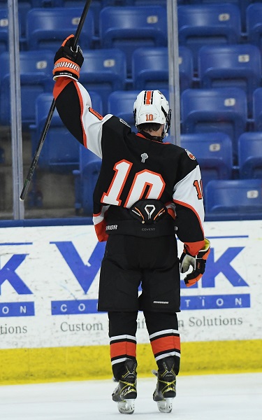 Rosa raises his stick in celebration after scoring Rice's first goal in the eventual 4-2 loss. 