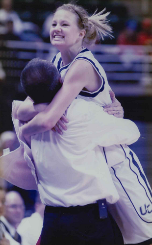 Soodsma and daughter Amber embrace during their team’s 2006 Class B Final victory.
