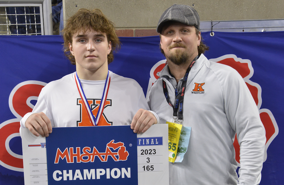 Kingsley’s Kyan Fessenden, left, shows his chart after defeating a past champion in his Finals bout. 