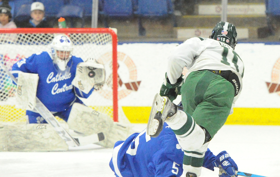 DCC goalie Kyle Moore makes a save during his shutout performance.