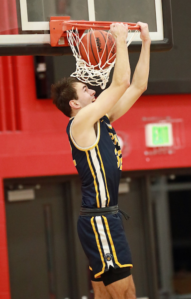 Jamison throws down a dunk.