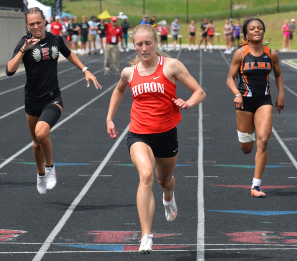 Anderson, middle, outpaces the field to also win the 200.