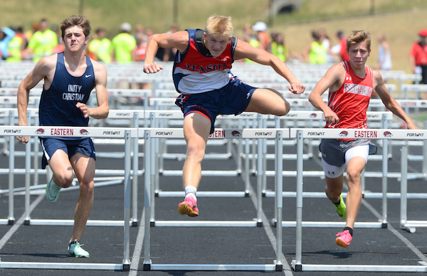 Mason's Tyler Baker, center, works to stay ahead in the 110 hurdles.