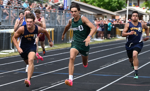 Bark River-Harris’ Kavin Frederick and Manistique’s Wyatt Demers race for the finish line, with Frederick crossing first by one hundredth of a second. 