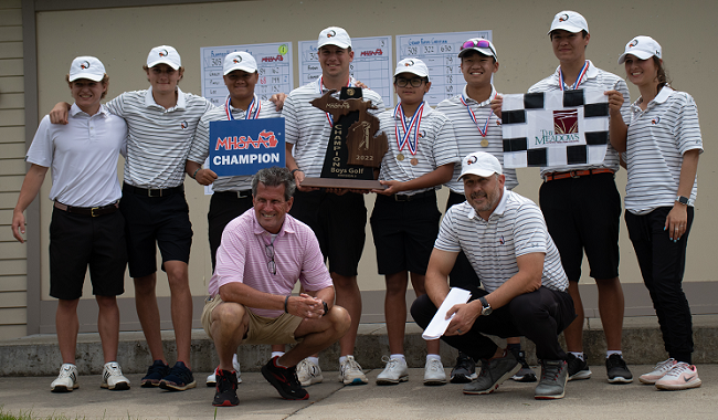 The Warriors celebrate their second-straight team title, including Pinili (standing, third from left) and his younger brother Leandro (standing, fourth from right