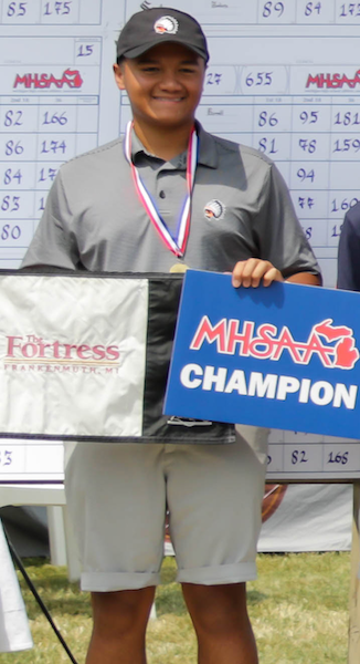 Brother Rice’s Lorenzo Pinili is awarded first place individually.