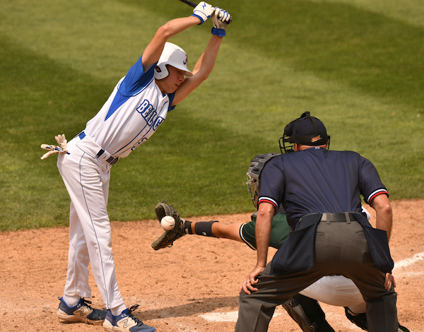 A Beal City hitter steps back to avoid an inside pitch.